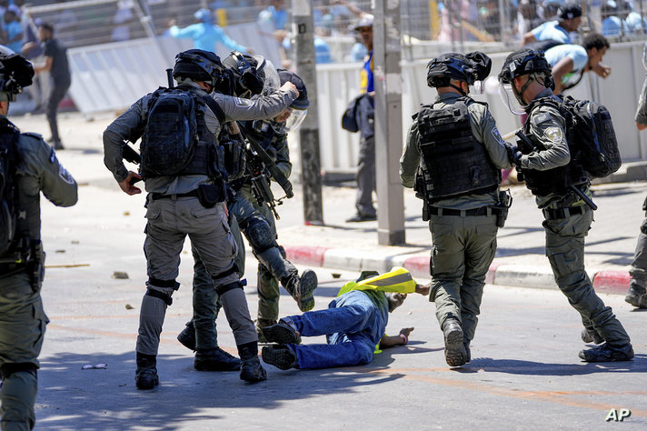 Eritrean protesters clash with Israeli riot police in Tel Aviv, Israel, Saturday, Sept. 2, 2023. Hundreds of Eritrean asylum…