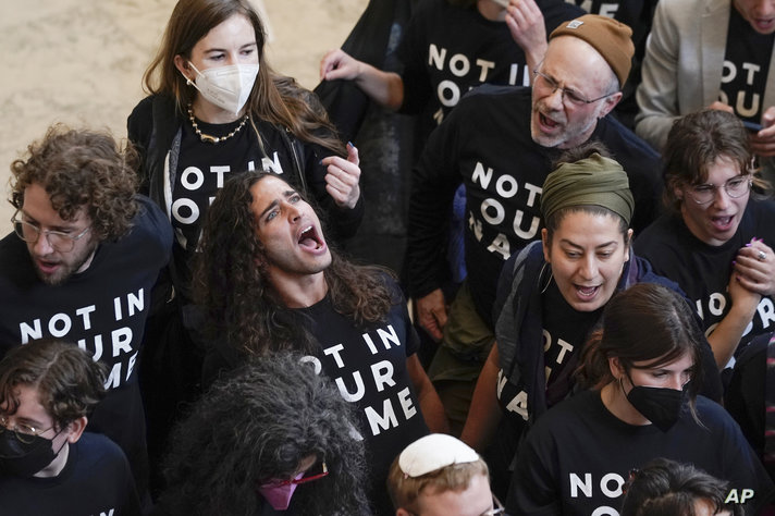 Demonstrators protest inside the Cannon House Office Building on Capitol Hill in Washington, Wednesday, Oct. 18, 2023.  (AP…