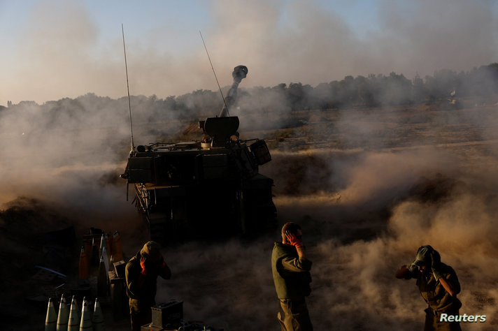 Israeli military units operate at an undisclosed location near the Gaza Strip border