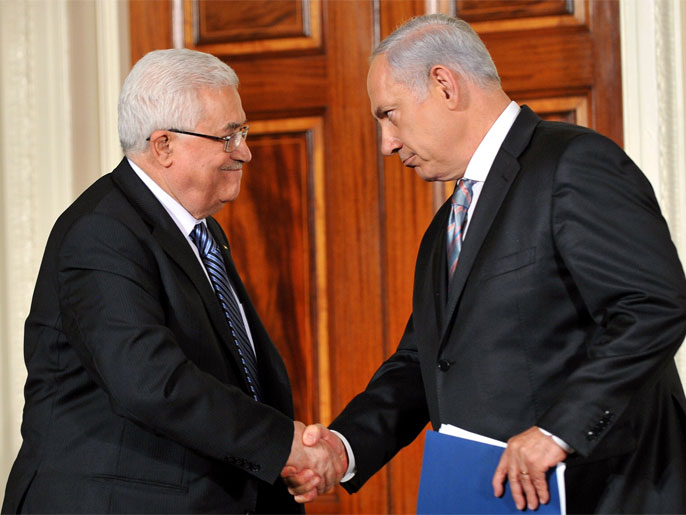 Prime Minister Benjamin Netanyahu of Israel (R) shakes hands with President Mahmoud Abbas of the Palestinian Authority (L) during an event in the East Room to make statements on the peace process on September 1, 2010 at the White House in Washington, DC.