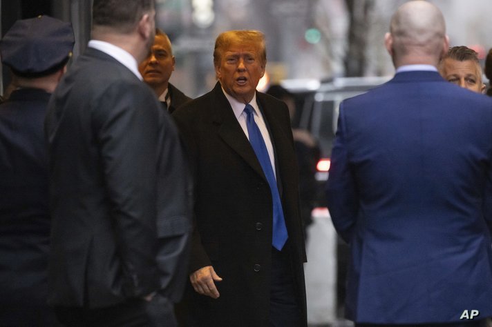 Former President Donald Trump leaves his apartment building, Thursday, Jan 25, 2024, in New York. (AP Photo/Yuki Iwamura)