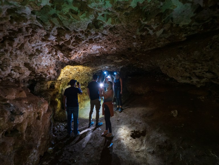 Riyadh, November 13, 2020. Tourists visit the bat cave near Edge of the World Tuwaiq escarpment, Saudi Arabia