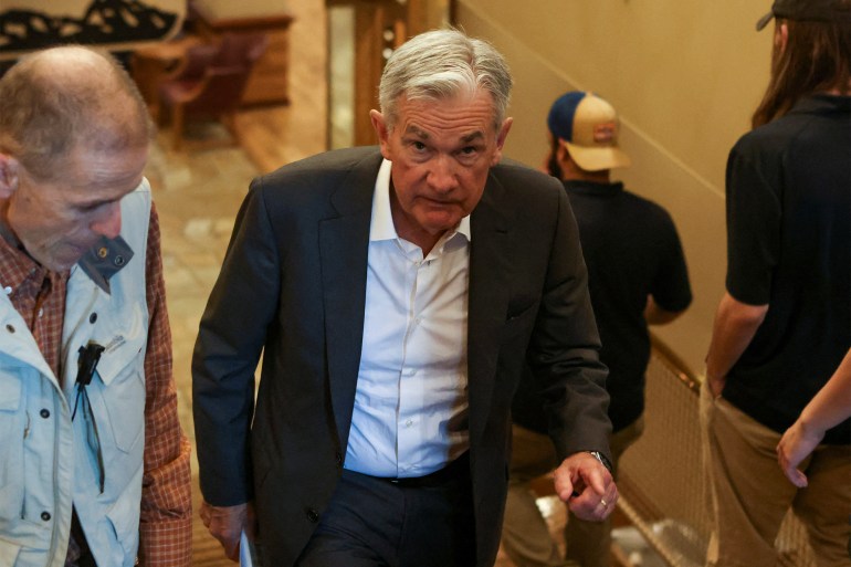 Jerome Powell, chair of the Federal Reserve walks in Teton National Park where financial leaders from around the world gathered for the Jackson Hole Economic Symposium outside Jackson, Wyoming, U.S., August 26, 2022. REUTERS/Jim Urquhart