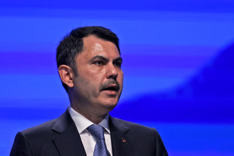 Turkish Environment Minister Murat Kurum delivers a speech at the Sharm el-Sheikh International Convention Centre, in Egypt's Red Sea resort city of the same name, during the COP27 climate conference on November 15, 2022. (Photo by AHMAD GHARABLI / AFP)