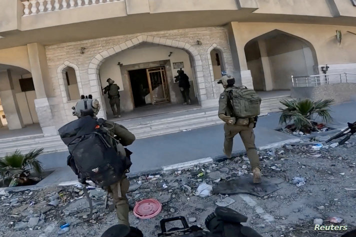 Israeli army members operate in an area given as Hamad, in Khan Younis in the southern Gaza Strip