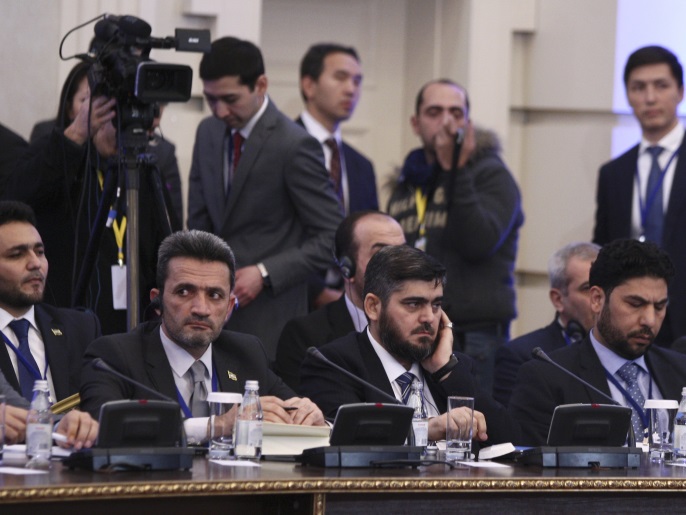 Mohammad Alloush (C), the head of the Syrian opposition delegation, attends Syria peace talks in Astana, Kazakhstan January 23, 2017. REUTERS/Mukhtar Kholdorbekov