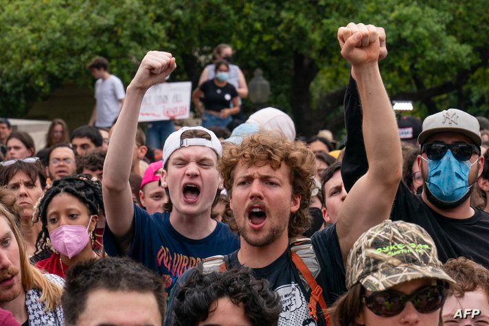 Demonstrators against the war in Gaza rally in support of Palestinians on the campus of the University of Texas in Austin,…