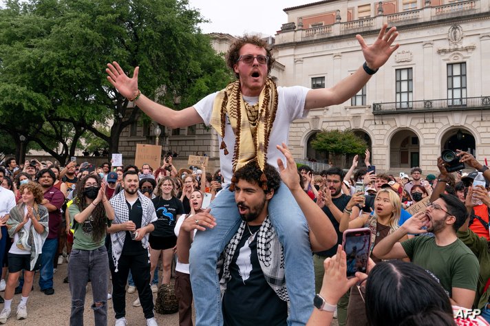 Demonstrators against the war in Gaza rally in support of Palestinians on the campus of the University of Texas in Austin,…