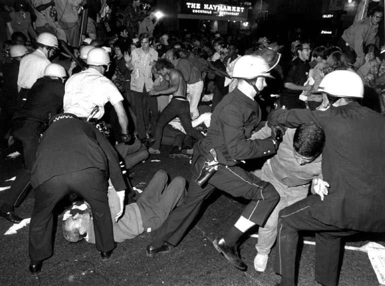 A melee breaks out between police and demonstrators near the Conrad Hilton Hotel on Chicago's Michigan Avenue during the Democratic National Convention on Aug. 28, 1968. (Bettman / Getty Images)