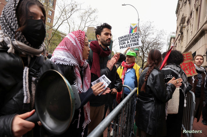 Demonstrators protest in solidarity with Pro-Palestinian organizers on the Columbia University campus, in New York City