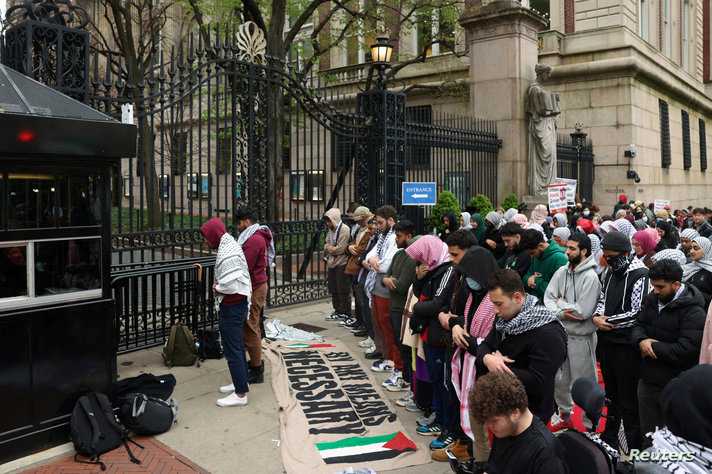 Demonstrators protest in solidarity with Pro-Palestinian organizers on the Columbia University campus, in New York City