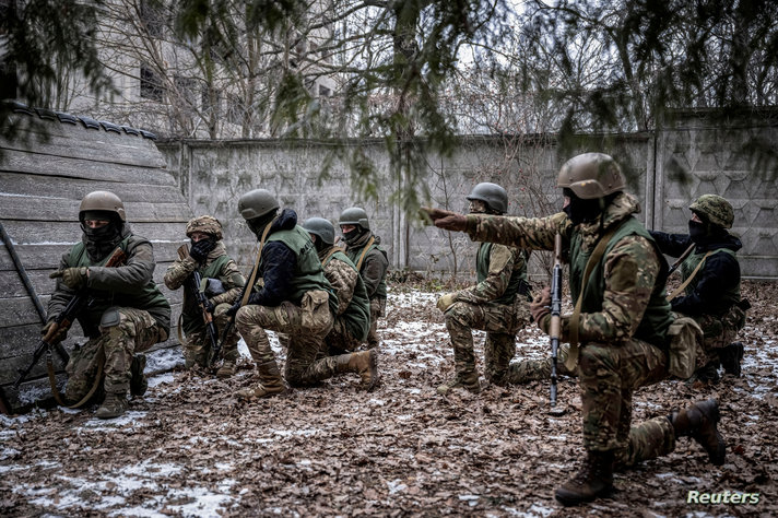 FILE PHOTO: Volunteers who aspire to join the 3rd Separate Assault Brigade of the Ukrainian Armed Forces attend basic training in the Kyiv region