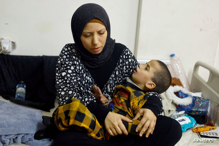 Palestinian children suffering from malnutrition receive treatment at al-Awda health centre, in Rafah, southern Gaza Strip