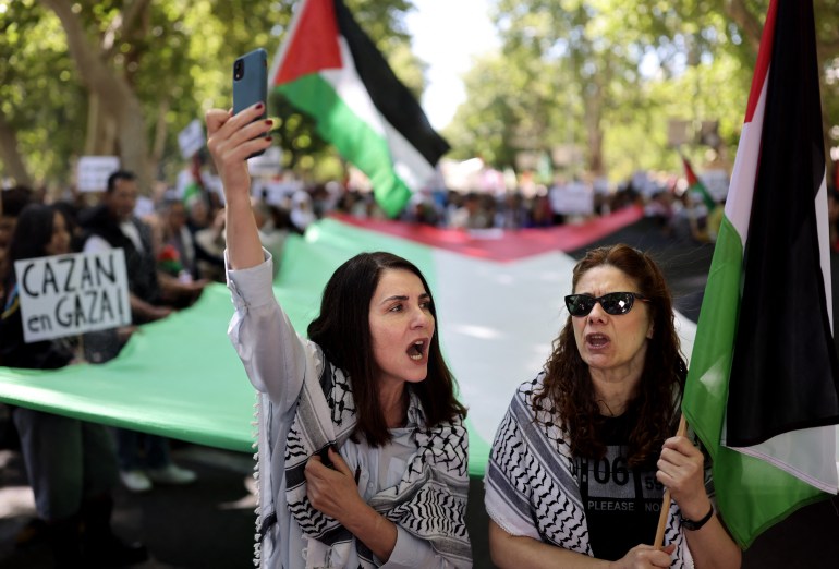 People rally in support of the people from the Gaza Strip, in the Palestinian territories, in Madrid on April 21, 2024. - Thousands of civilians, both Palestinians and Israelis, have died since October 7, 2023, after Palestinian Hamas militants based in the Gaza Strip entered southern Israel killing 1,200 people and took 240 people hostage, Israel says, in an unprecedented attack triggering a war declared by Israel on Hamas with retaliatory bombings on Gaza. (Photo by Thomas COEX / AFP)