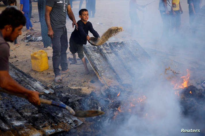 Aftermath of an Israeli strike on an area designated for displaced people, in Rafah in the southern Gaza Strip