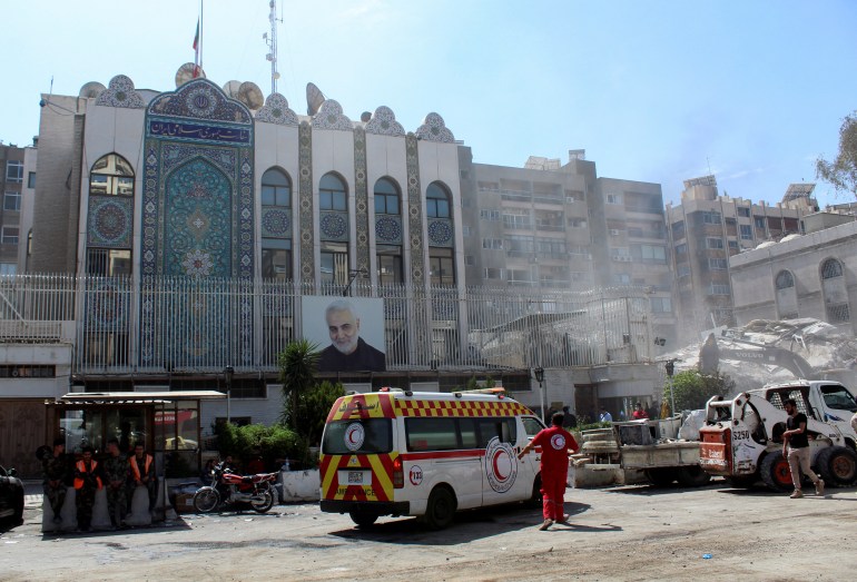 An ambulance is parked outside the Iranian embassy after a suspected Israeli strike on Monday on Iran's consulate, adjacent to the main Iranian embassy building, which Iran said had killed seven military personnel including two key figures in the Quds Force, in the Syrian capital Damascus, Syria April 2, 2024. REUTERS/Firas Makdesi