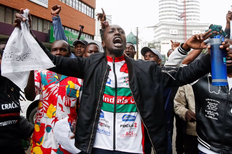 Protestors react during a demonstration against Kenya's proposed finance bill 2024/2025, in Nairobi, Kenya, June 20, 2024. REUTERS