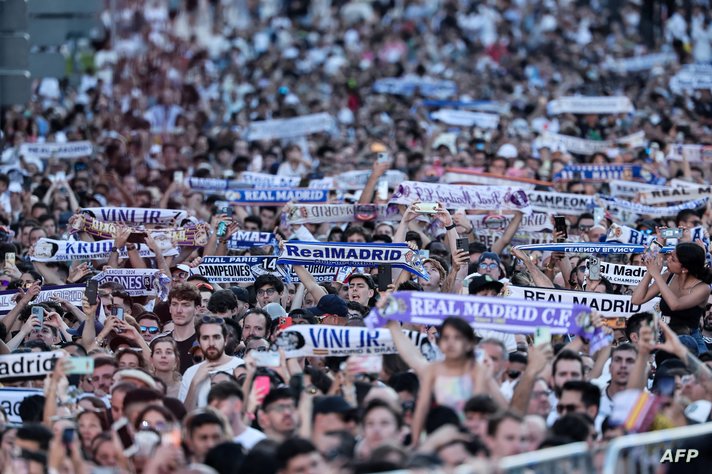 Real Madrid fans crowd Cibeles square to celebrate their team's 15th Champions League trophy, one day after beating Borussia…