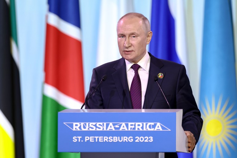 Russian President Vladimir Putin speaks during a joint media statement with Comoros President and the Chairperson of the African Union at the second Russia-Africa summit in Saint Petersburg on July 28, 2023. (Photo by Valery SHARIFULIN / TASS Host Photo Agency / AFP) / RESTRICTED TO EDITORIAL USE - MANDATORY CREDIT "AFP PHOTO / TASS HOST PHOTO AGENCY / VALERY SHARIFULIN" - NO MARKETING NO ADVERTISING CAMPAIGNS - DISTRIBUTED AS A SERVICE TO CLIENTS - RESTRICTED TO EDITORIAL USE - MANDATORY CREDIT "AFP PHOTO / TASS Host Photo Agency / Valery Sharifulin" - NO MARKETING NO ADVERTISING CAMPAIGNS - DISTRIBUTED AS A SERVICE TO CLIENTS /