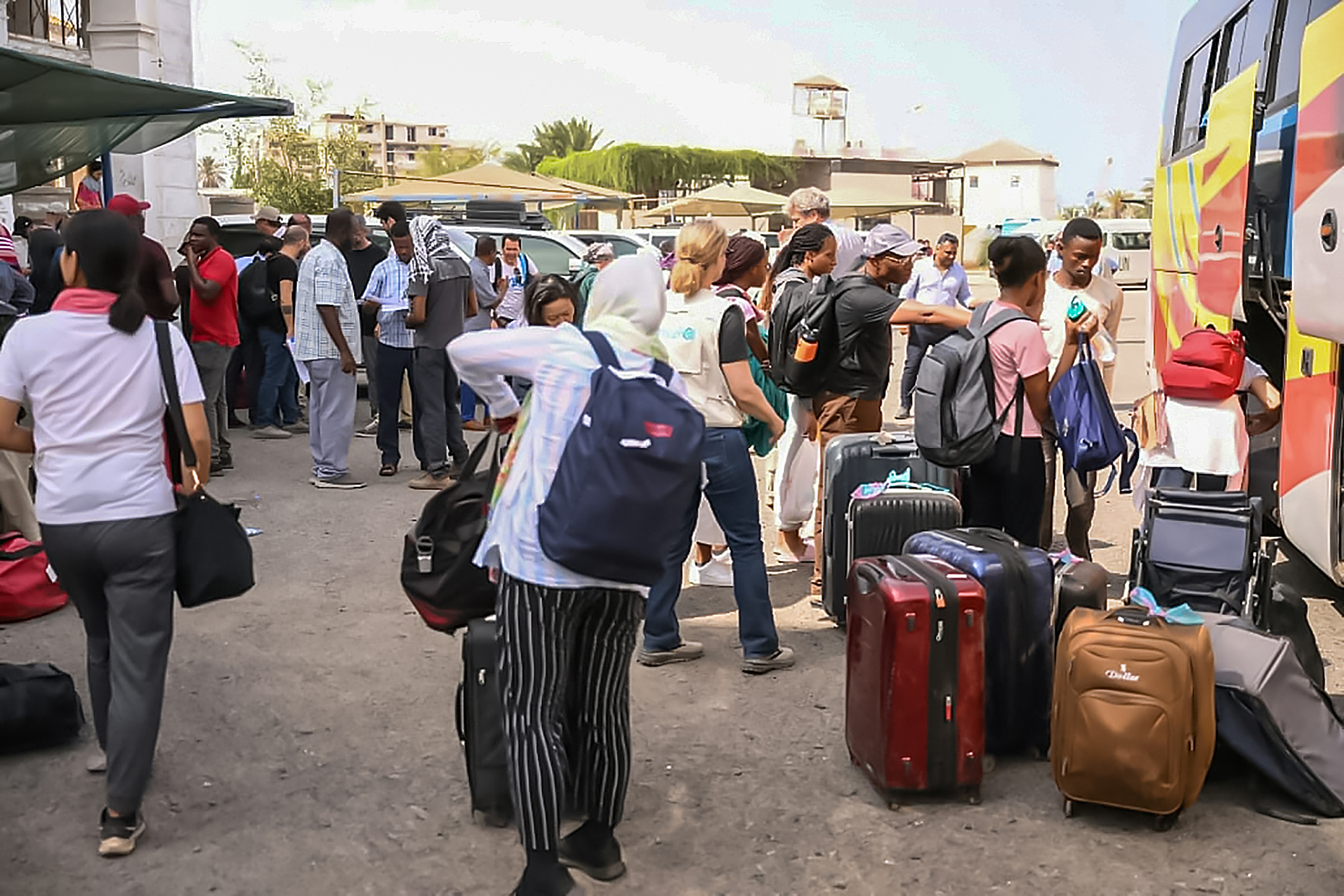 Internationally-recruited personnel of the United Nations Integrated Transition Assistance Mission in Sudan are evacuated from…