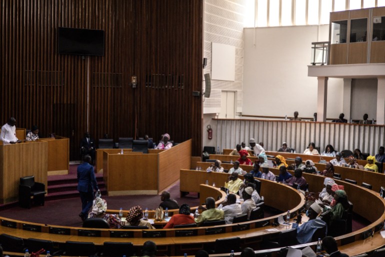 Members of the National Assembly look on at the start of the examination of the proposed amnesty law in Dakar on March 6, 2024. (Photo by JOHN WESSELS / AFP)