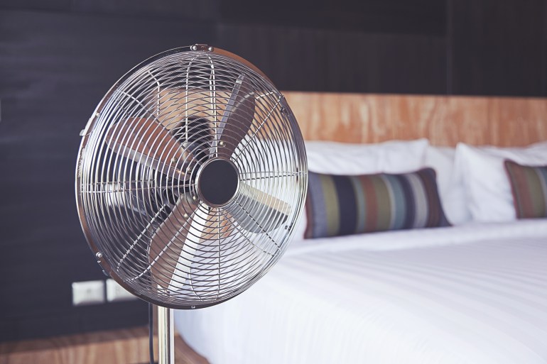 Bed room and metal fan.; Shutterstock ID 329967176; purchase_order: AJ; job: ; client: ; other: