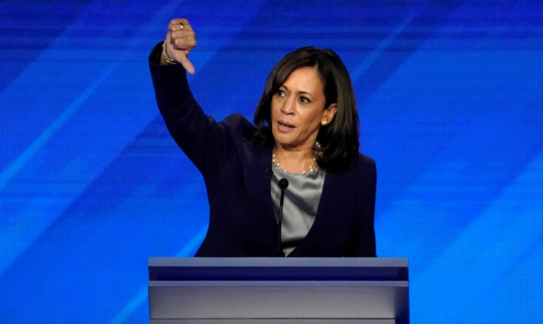 Senator Kamala Harris gives a thumbs down as she speaks during the 2020 Democratic U.S. presidential debate in Houston, Texas, U.S.