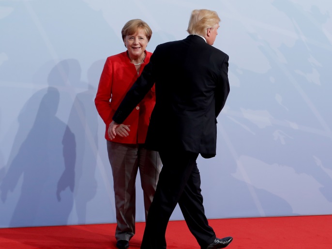 German Chancellor Angela Merkel welcomes U.S. President Donald Trump to the opening day of the G20 leaders summit in Hamburg, Germany, July 7, 2017. REUTERS/Ian Langsdon/Pool