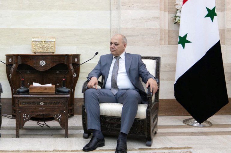 Syrian Prime Minister Mohammad Ghazi al-Jalali meets with Iranian Foreign Minister Abbas Araqchi in Damascus, Syria October 5, 2024. Iran's Foreign Ministry/WANA (West Asia News Agency)/Handout via REUTERS ATTENTION EDITORS - THIS PICTURE WAS PROVIDED BY A THIRD PARTY. BEST QUALITY AVAILABLE.