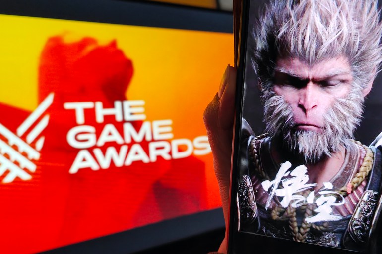 SHANGHAI, CHINA - DECEMBER 13: A smartphone screen shows the poster of "Black Myth: Wukong" against the logo of The Game Awards 2024 on December 13, 2024 in Shanghai, China. The "Black Myth: Wukong" wins the Best Action Game and Players' Voice awards at The Game Awards 2024 on December 13. (Photo by VCG/VCG via Getty Images)