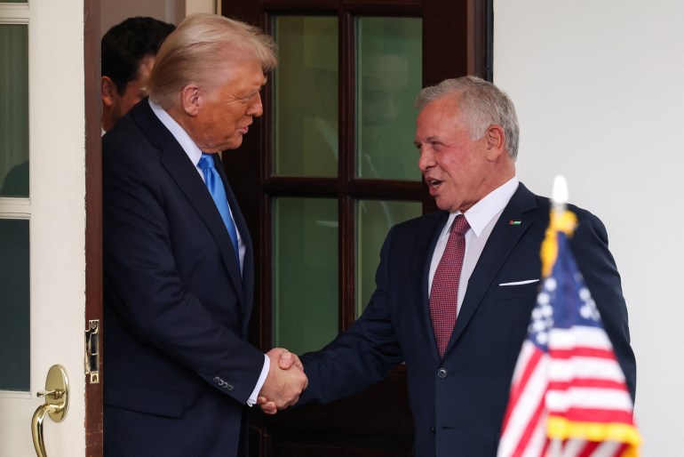 U.S. President Donald Trump and Jordan's King Abdullah shake hands, after their meeting, at the White House in Washington, U.S., February 11, 2025. REUTERS/Kevin Lamarque