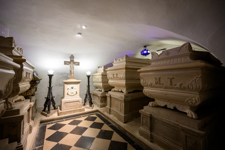 This photograph shows the tomb holding the remains of the King Charles X of France in the crypt of the Kostanjevica Monastery in Nova Gorica, Slovenia on January 23, 2025. Film director Anja Medved has long dwelled on the pain of her grandmum, who was separated from her family when the border between Italy and then Yugoslavia was drawn up after World War II in 1947. Since then, the barbed wire has disappeared as the European Union and then Schengen abolished controls, and this year the European Capital of Culture, for the first time a cross-border event, brings together Gorizia and its younger twin Nova Gorica. (Photo by Jure Makovec / AFP)