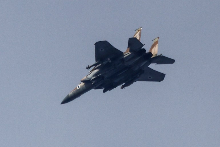 An Israeli fighter jet flies, amid the ongoing conflict between Israel and Hamas, as seen from Israel, January 14, 2025. REUTERS/Amir Cohen